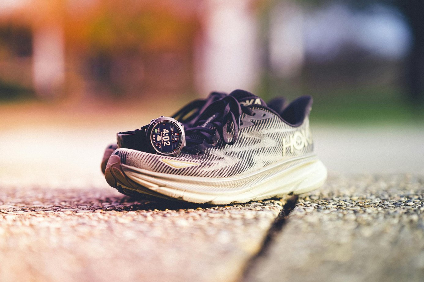 a pair of hoka running shoes with